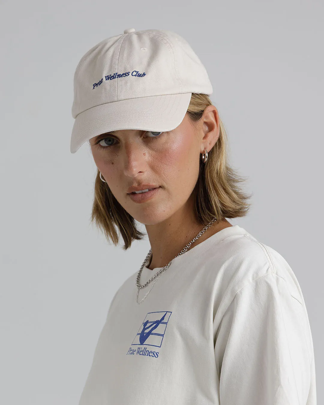 Prae Wellness Club Cap – Cream / Blue